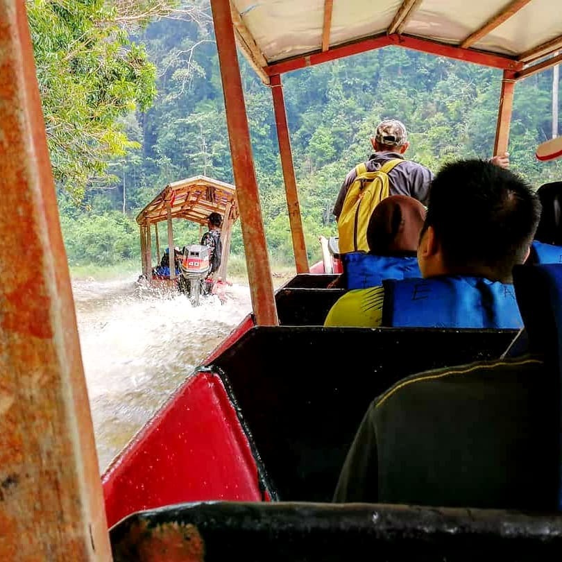 Boat ride through the rainforest at Taman Negara Pahang, Malaysia